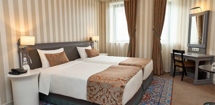 Riverside arrival and heritage hotel travel setting